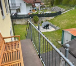 Balkon und Treppe zum Garten Wg. OG